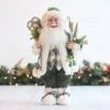 41cm Green Standing Santa With Racket And Skis 1 41cm Green Standing Santa With Racket And Skis -Christmas Decorations 1243467